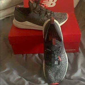 Sz 7 1/2 new balance bulk/orange cross trainers